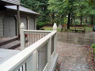 driveway with concrete and pavers
